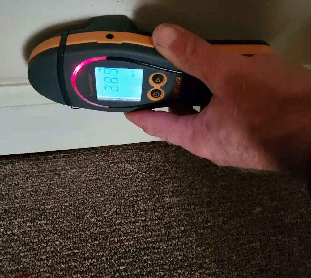 Moisture detection at baseboard during Sewage Cleanup & Sanitation in Peachtree City